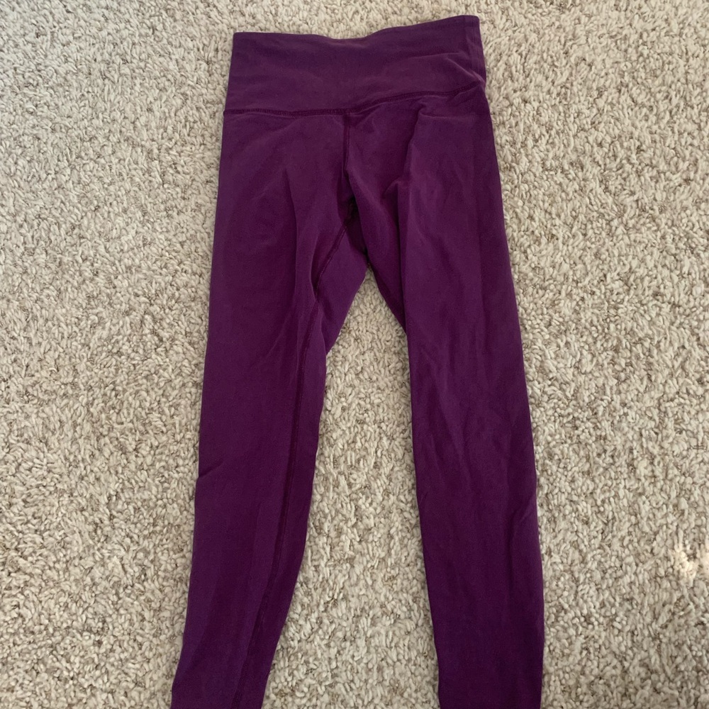 Purple leggings.